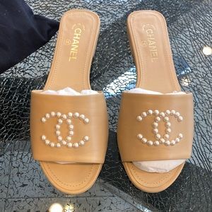 Brand New with box and dust bags. Chanel slipper size 9.5 color nude.